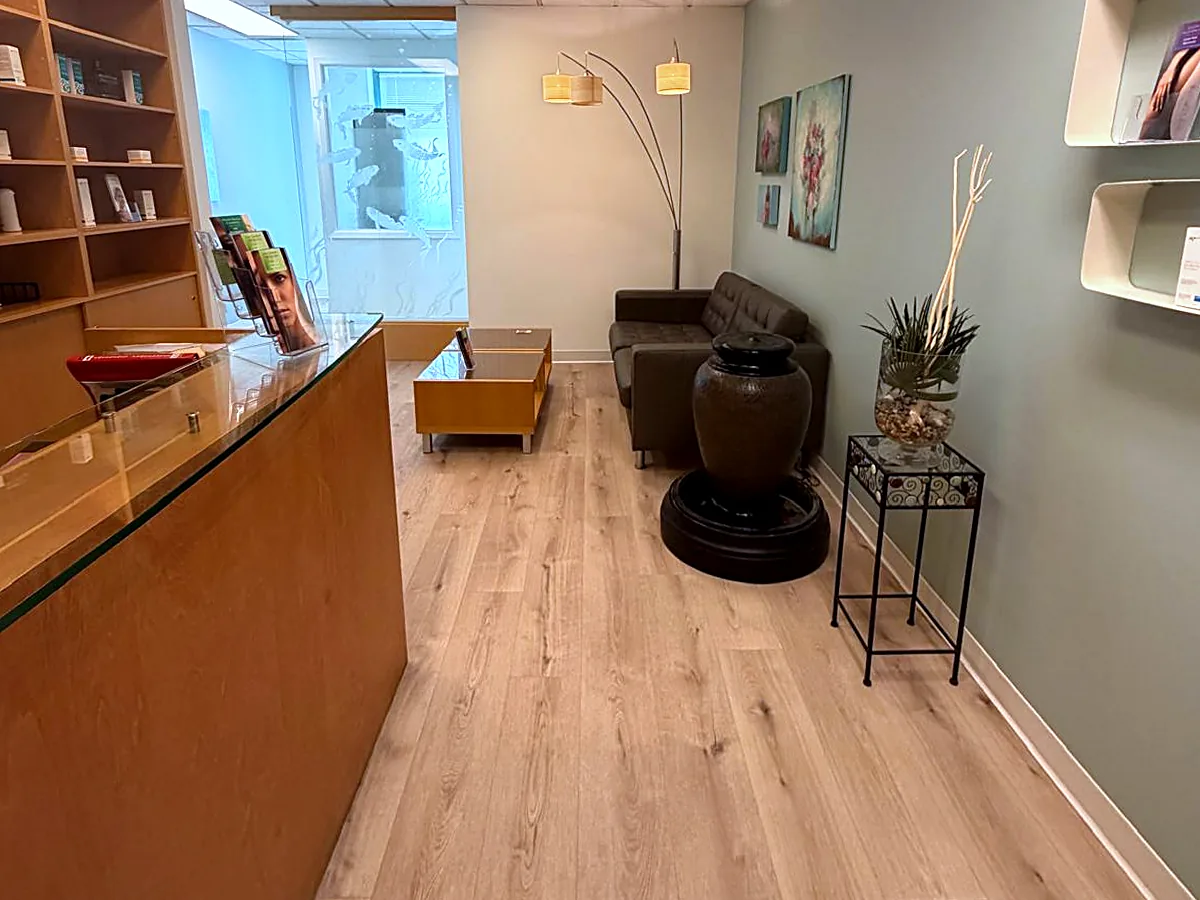 Reception and waiting area at Pure Light Laser Clinic on West Broadway