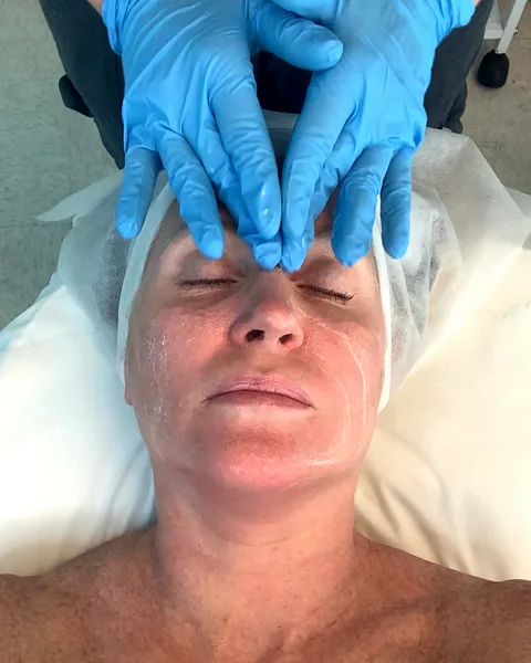 Facial massage during a facial at Pure Light Laser in Vancouver
