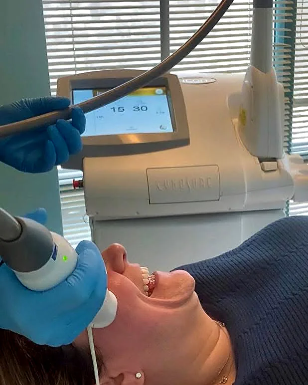 Rita Moldovanos giving a 1540 erbium fractional laser treatment at Pure Light Laser in Vancouver